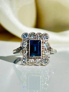*Vintage Sapphire and Diamond Platinum Cluster Panel Ring: Vintage Sapphire and Diamond Platinum Cluster Panel Ring &nbsp; This ring is gorgeous and holds an inky but sapphire at the centre of a halo of sparkling diamonds.&nbsp; &nbsp; The sapphire measures 7