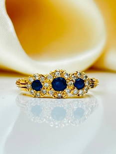 18ct Yellow gold Sapphire and diamond triple cluster ring: 18ct Yellow gold Sapphire and diamond triple cluster ring  truly sweet and dainty triple cluster&#160;  measurements&#160; size UK M US 61/2 head of ring 15mm x 6mm weight 4g hallmarked 750
