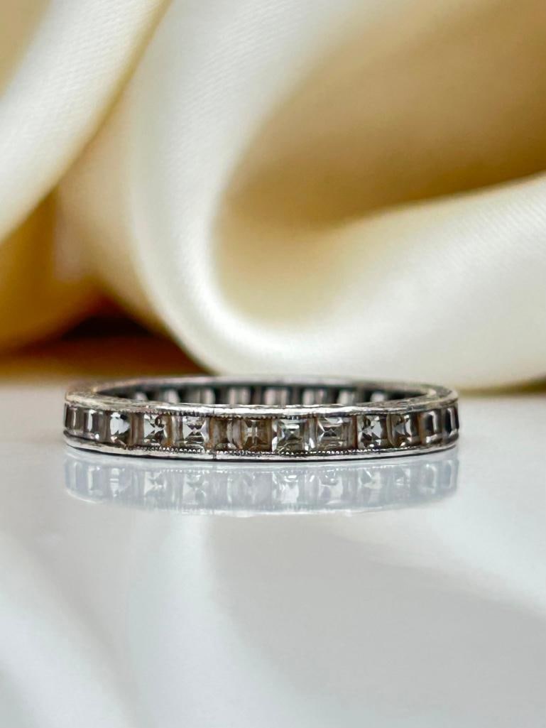 Eternity Band Ring in White Gold: Eternity Band Ring in White Gold wonderful stacker eternity Measurements: size UK M1/2 US 61/2 band width 2mm weight 1.31g Materials: 