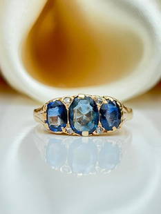 Chunky 18ct yellow gold sapphire and diamond 3 stone ring: Chunky 18ct yellow gold sapphire and diamond 3 stone ring  Gorgeous and chunky !!  measurements size UK T1/2 US 93/4 head of ring 16mm x 8mm weight 5.36g stamped 18ct  materials&#160;