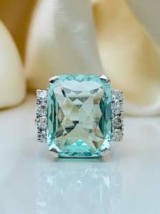 huge aquamarine and diamond cocktail ring set in 14k white gold: huge aquamarine and diamond cocktail ring set in 14k white gold  Aquamarine approx 14.62ct, truly exceptional&#160;  measurements&#160; UK H1/2 US 41/4 head of ring 16mm x 15mm weight 6.68g stamped 14