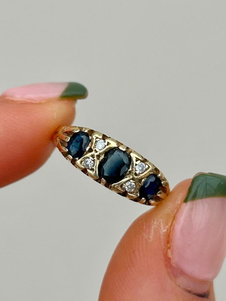Yellow Gold Diamond and Sapphire Ring: Diamond and sapphire ring wonderful chunky sapphire stones measurements ring size UK N1/2 or US 7 head of ring 15x5mm weight 2.03g hallmarked 9ct condition: see photos office use: uq2