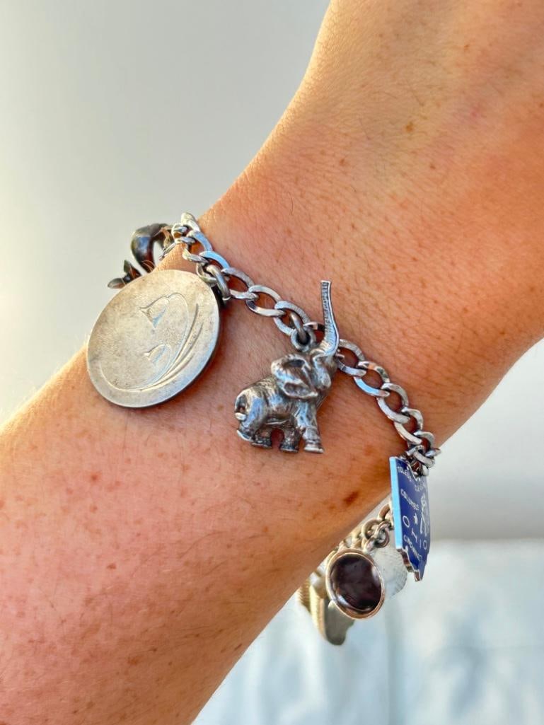 Heavy Vintage Silver Curb Link Charm Bracelet: Heavy Vintage Silver Curb Link Charm Bracelet full of wonderful charms measurements length 18.5cm Weight: 39g materials silver 