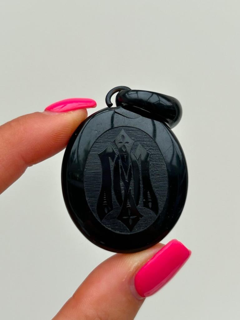 Chunky Antique Carved Onyx Locket Back Pendant: Chunky Antique Carved Onyx Locket Back Pendant charming large locket measurements size 46mm x 35mm weight 12.62g materials onyx 