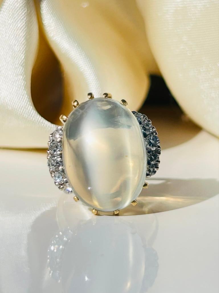 Large 18ct yellow gold moonstone and diamond cocktail ring: Large 18ct yellow gold moonstone and diamond cocktail ring truly exceptional measurements size UK O1/2 US head of ring 20mm x 19mm weight 10.38g hallmarked 750 materials