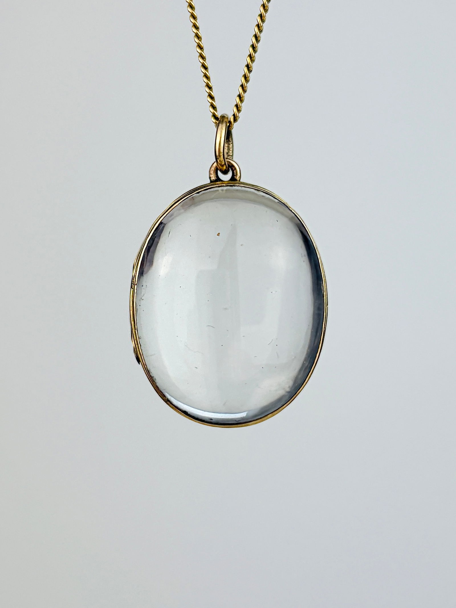 Antique Large Sized 9ct Gold Rock Crystal Domed 'Pool of Light' Locket Pendant: Antique Large Sized 9ct Gold Rock Crystal Domed 'Pool of Light' Locket Pendant Opens so you can add pictures or more!