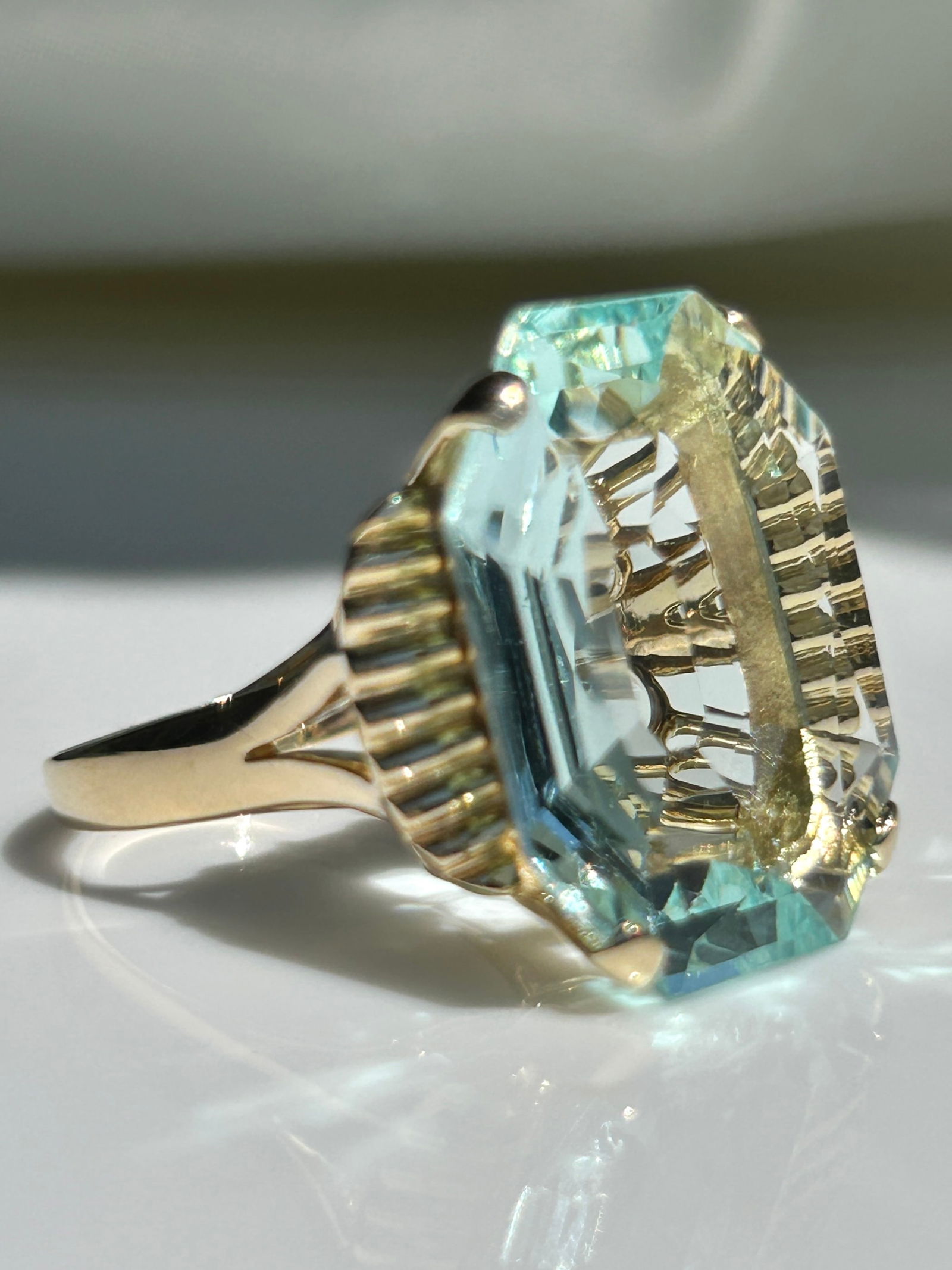 Outstanding 24 x 20mm Aquamarine Cocktail Ring Set in 14ct Yellow Gold: Outstanding Aquamarine Cocktail Ring Set in 14ct Yellow Gold measures : 24 x 20mm Depth from finger 1.5 cm Weight 11.7 g Ring Size UK T / USA 9 3/4 Office use