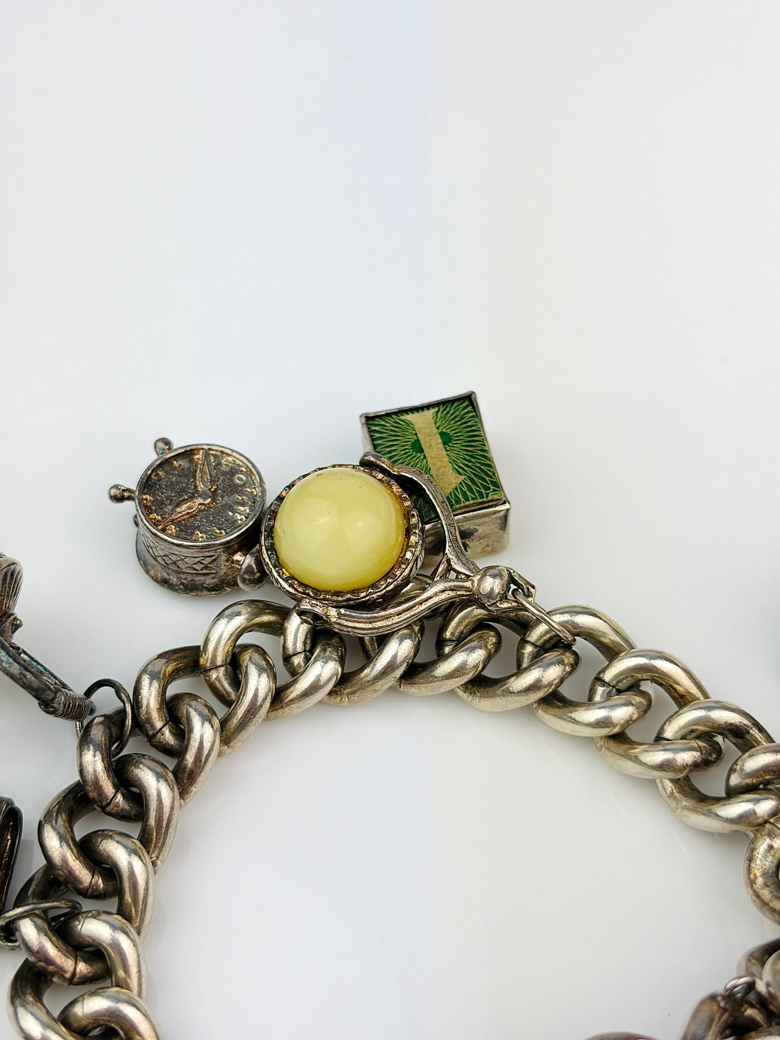 heavy silver charm bracelet with rare opening charms. - very heavy - 4