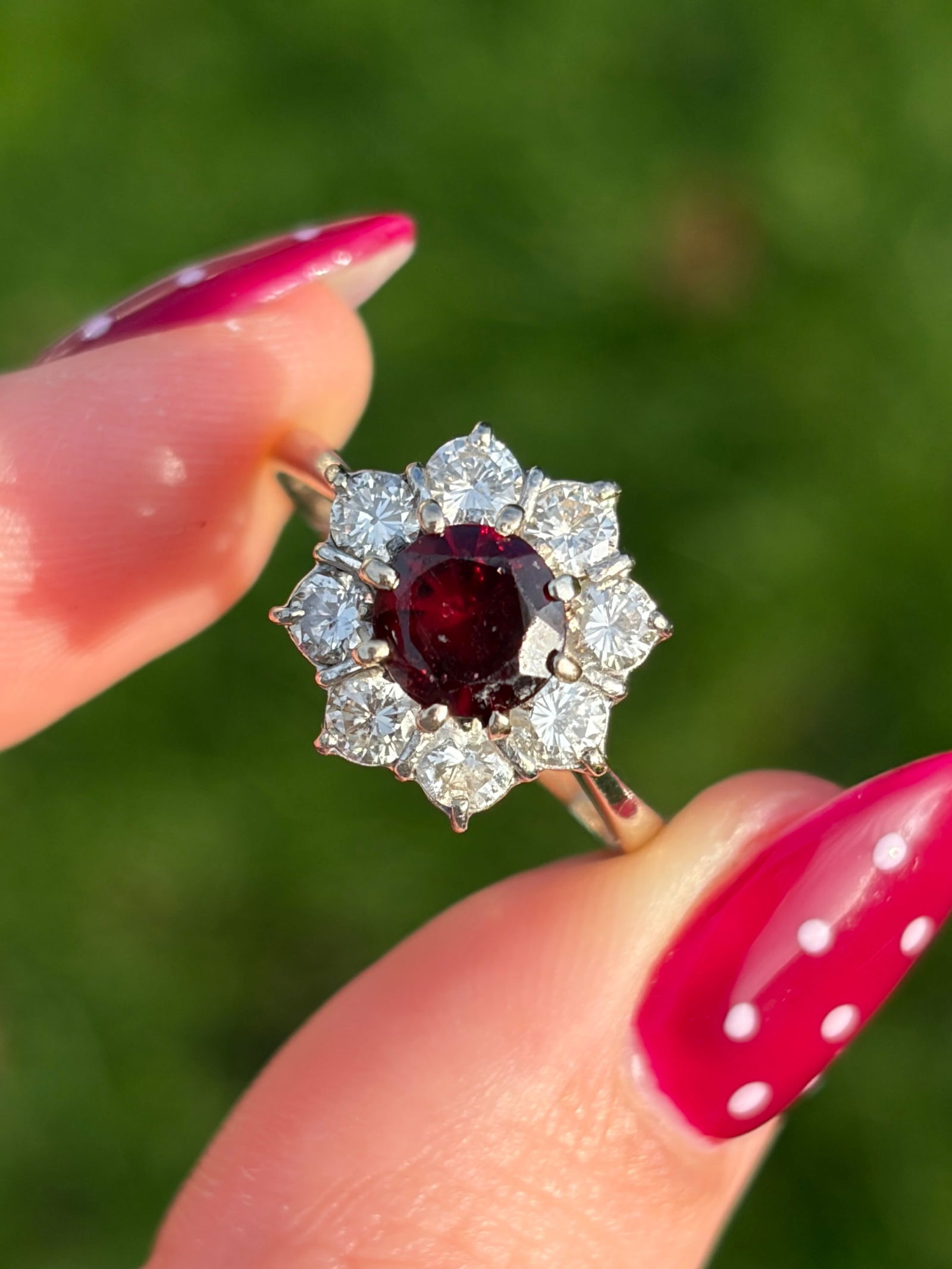 Chunky 18ct White Gold Diamond and Tourmaline Flower Ring: chunky 18ct white gold diamond and tourmaline flower ring diamonds approx .80pts Stunning tourmaline that flashes a bright red in the sun! Weight: 3.62g Size: UK P, US 8, Face of