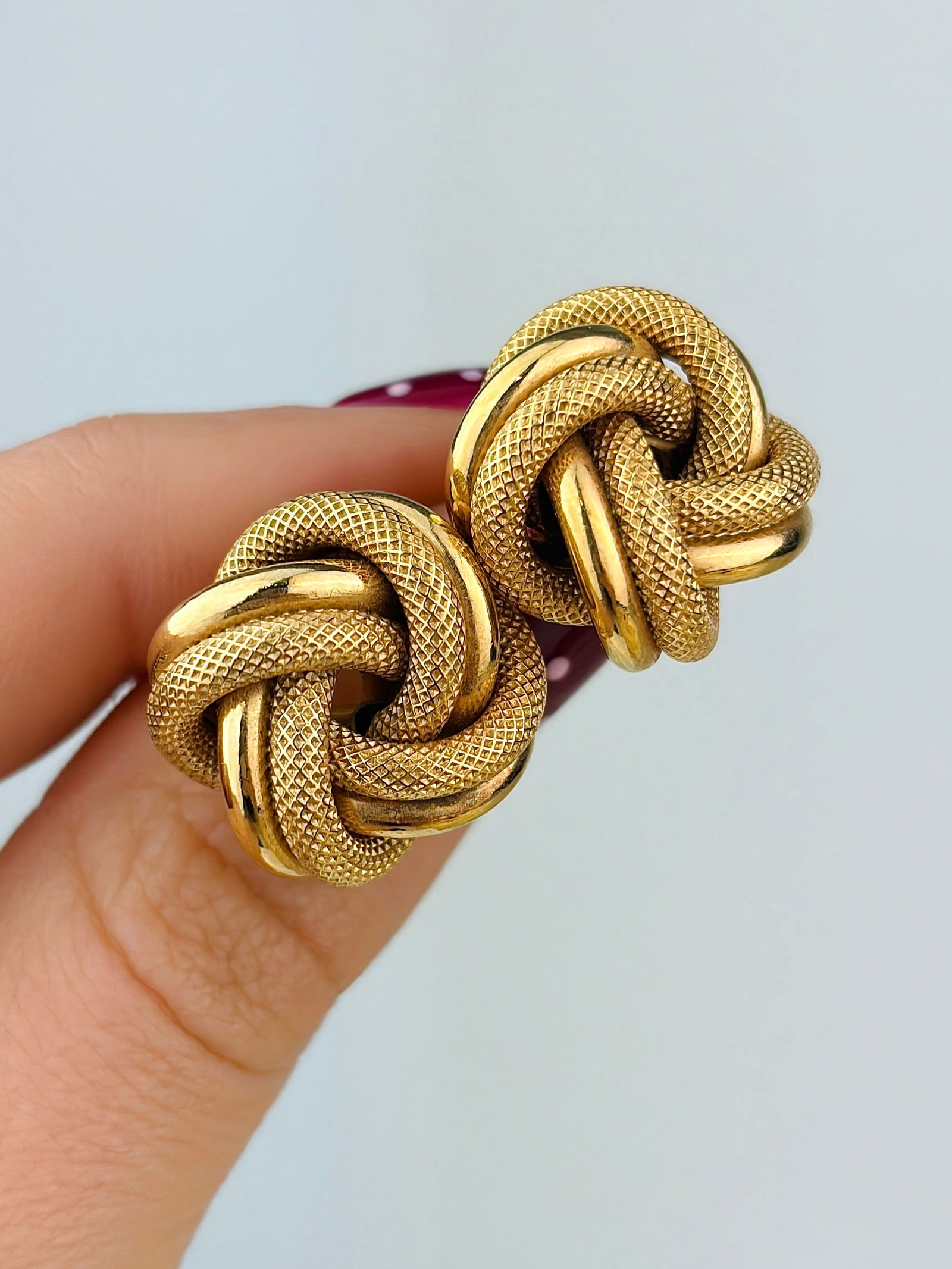 large vintage textured 9ct gold knot earrings: large vintage textured 9ct gold knot earrings GIANT Amazing textured knot earrings! Weight: 4.3g Size: 16x15mm, depth 10mm Materials: 9ct gold Hallmarks: 375 stamp on