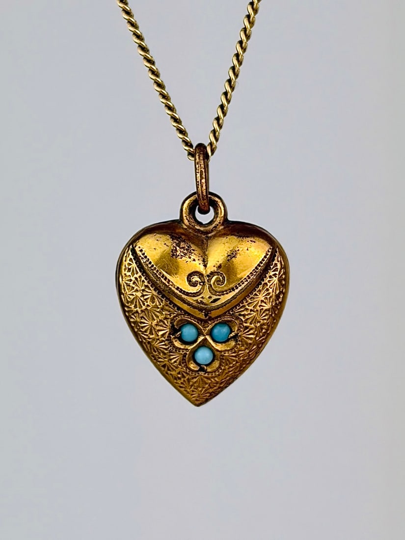 antique yellow metal turquoise turquoise heart pendant: antique yellow metal turquoise turquoise heart pendant