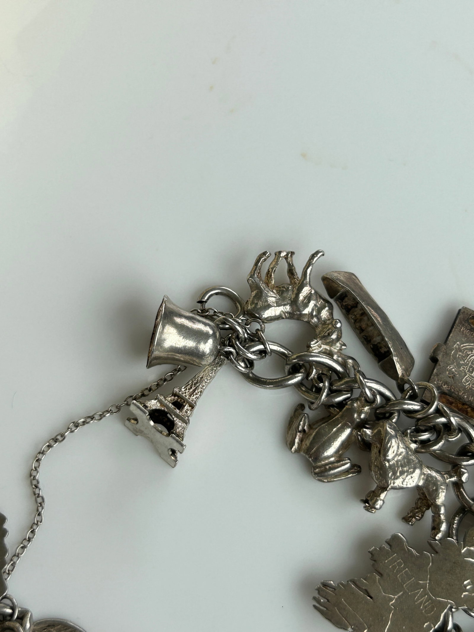 Vintage Heavy Silver Charm Bracelet with Enamel and Articulated Silver Charms - 8