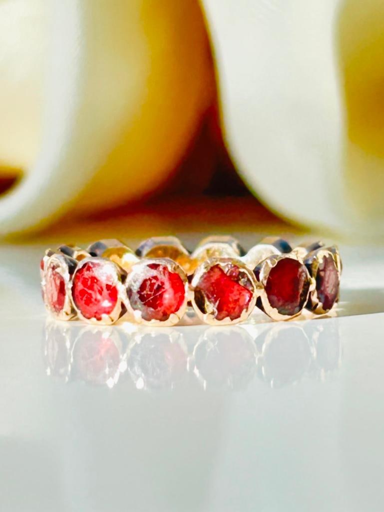 Antique Georgian Era Flat Cut Garnet Full Eternity Band Ring in Gold: Antique Georgian Era Flat Cut Garnet Full Eternity Band Ring in Gold beautiful glowing garnets, truly lovely measurements size UK L US 6 band width 3mm Weight: 1.81g 