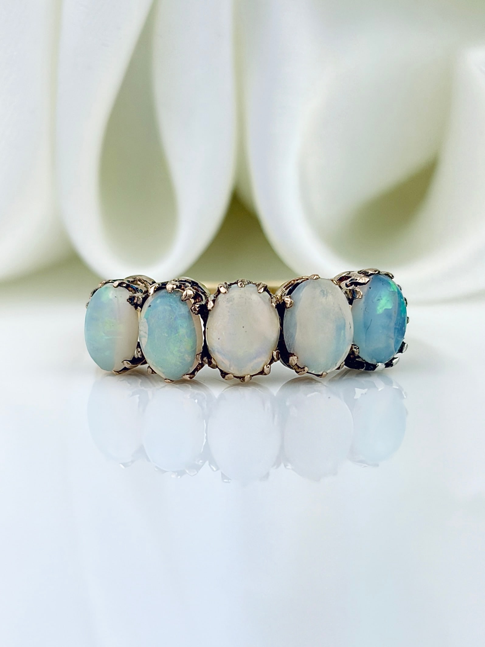 ANTIQUE 9CT YELLOW GOLD OPAL 5 STONE RING: ANTIQUE 9CT YELLOW GOLD OPAL 5 STONE RING The prettiest ring featuring 5 candy coloured opals!