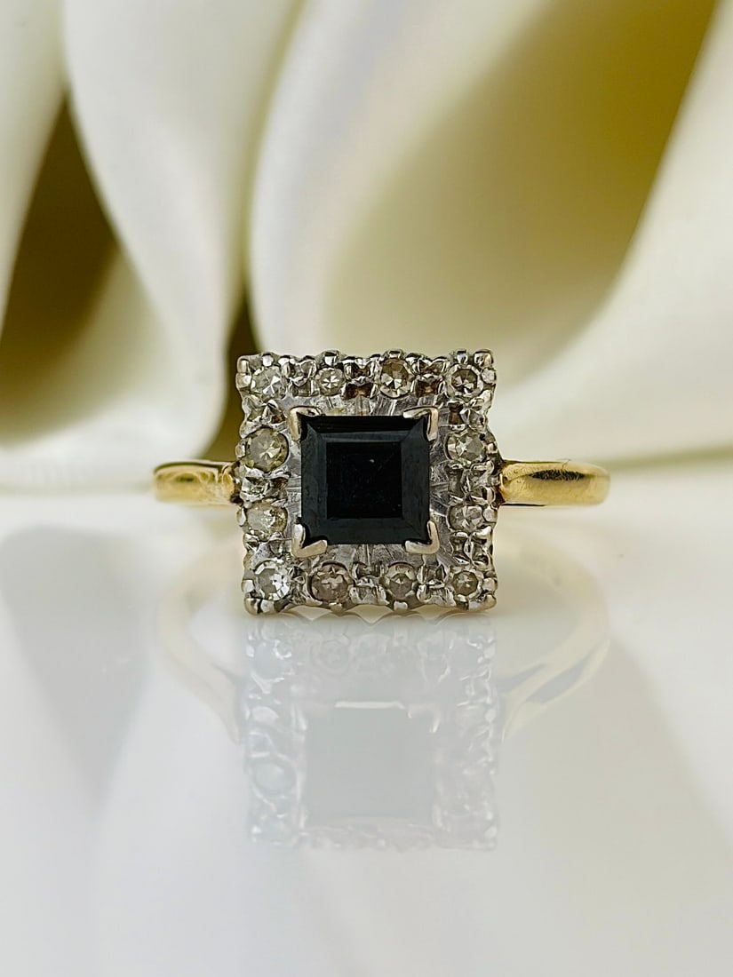 18ct yellow gold sapphire and diamond square ring: 18ct yellow gold sapphire and diamond square ring so charming! Weight: 3.09g Size: UK I1/2, US 5, Face of ring 9x9mm, Height off finger 5mm Materials: 18ct yellow