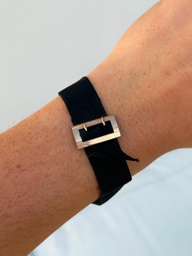 Antique Rolled Gold Grosgrain Bracelet with Dog Clip Clasp and TBar: Antique Rolled Gold Grosgrain Bracelet with Dog Clip Clasp and TBar charming bracelet measurements length 20.5cm width 20mm weight 6.92g materials rolled gold 