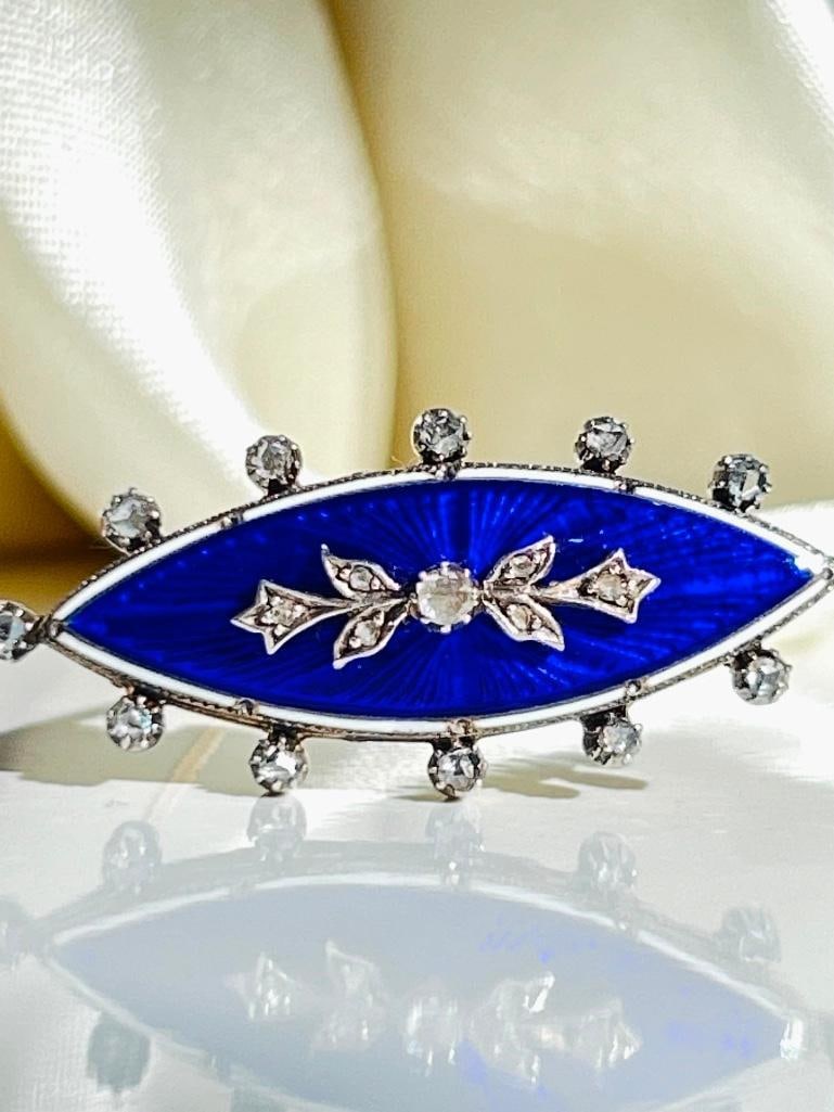 *Antique c.1860 Blue Enamel and Rose Cut Diamond Navette Shaped Brooch in Gold: Antique c.1860 Blue Enamel and Rose Cut Diamond Navette Shaped Brooch in Gold truly charming blue enamel detailed brooch measurements size 39mm x 18mm weight 7.93g </