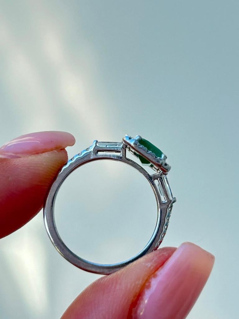 *Vintage 14K White Gold Emerald and Diamond Ring: Vintage 14K White Gold Emerald and Diamond Ring Delightful Emerald and Diamond halo ring with lovely baguette cut diamond shoulders set entirely in 14K White Gold. measurements size UK K