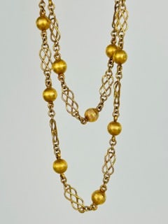 18ct Yellow Gold Ball and Infinity Link Chain Necklace: 18ct Yellow Gold Ball and Infinity Link Chain Necklace Weight: 22.47g Size: Length 73cm, Ball width 5mm Materials: 18ct yellow gold Hallmarks: Stamped 750 Condition: The overall condition is very