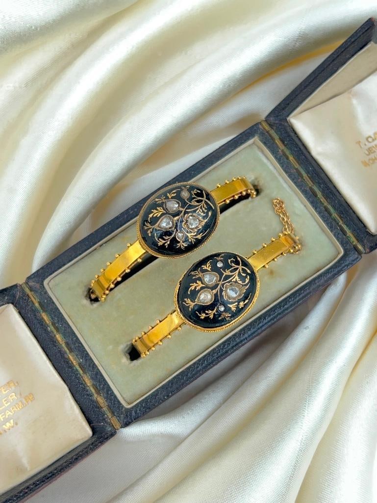 Rare pair of antique black enamel 18ct yellow gold and rose diamond bangle bracelet: Rare pair of antique black enamel 18ct yellow gold and rose diamond bangle bracelet Housed in a fitted antique box, truly charming measurements inner diameter 45mm x 40mm width 19mm weig