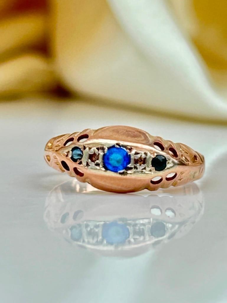 Sweet 9ct Gold Sapphire and Diamond 5 Stone Ring: Sweet 9ct Gold Sapphire and Diamond 5 Stone Ring very sweet and charming measurements size UK L1/2 US 6 head of ring 13mm x 6mm weight 1.11g hallmarked 9.375 