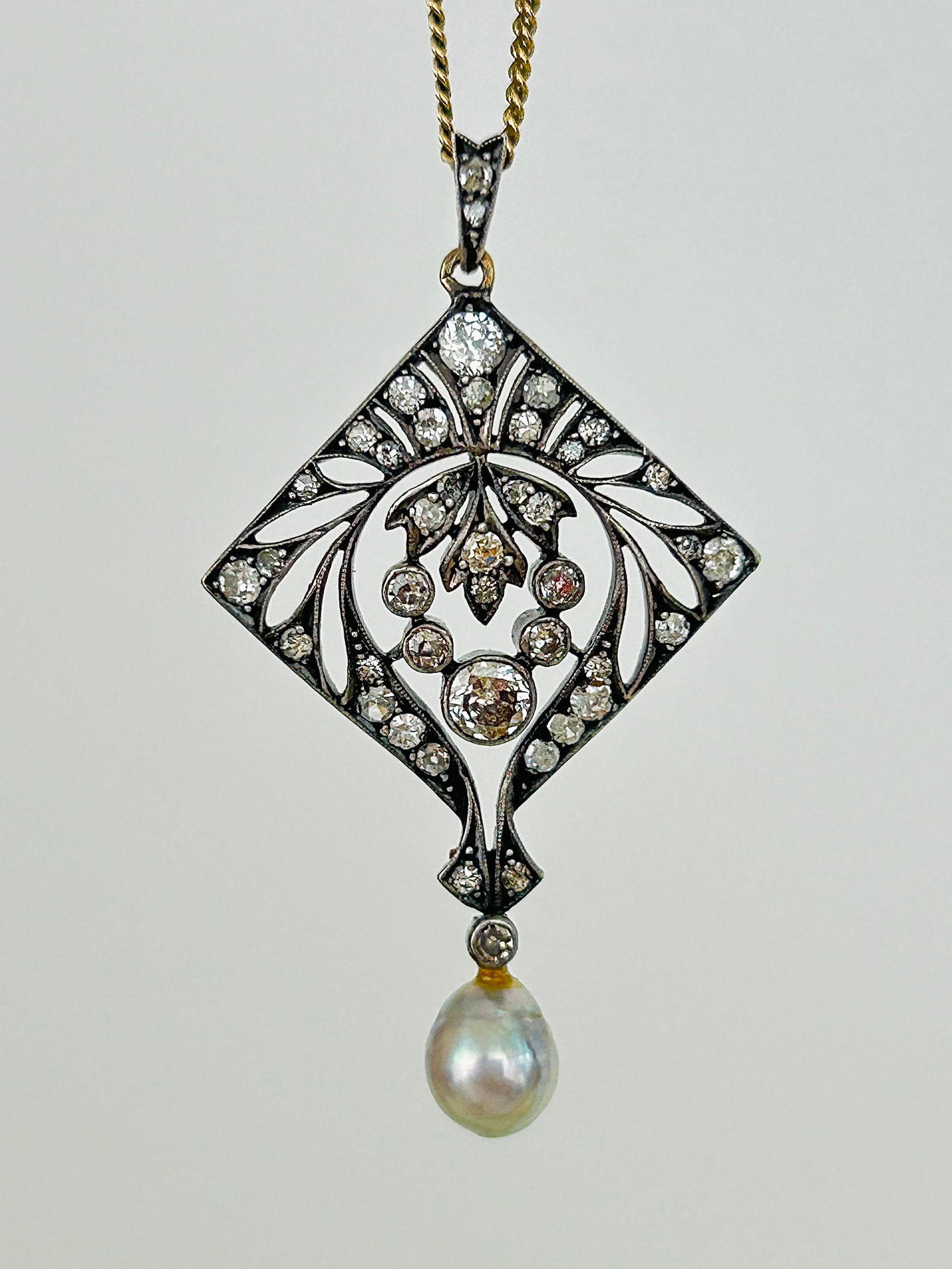 Antique Belle Epoque Diamond and Pearl Drop Pendant: Antique Belle Epoque Diamond and Pearl Drop Pendant Weight: 4.47g Size: 40x27x4mm Condition: The overall condition is very good Office Use: SZZ The item will be sent in a gift box. 