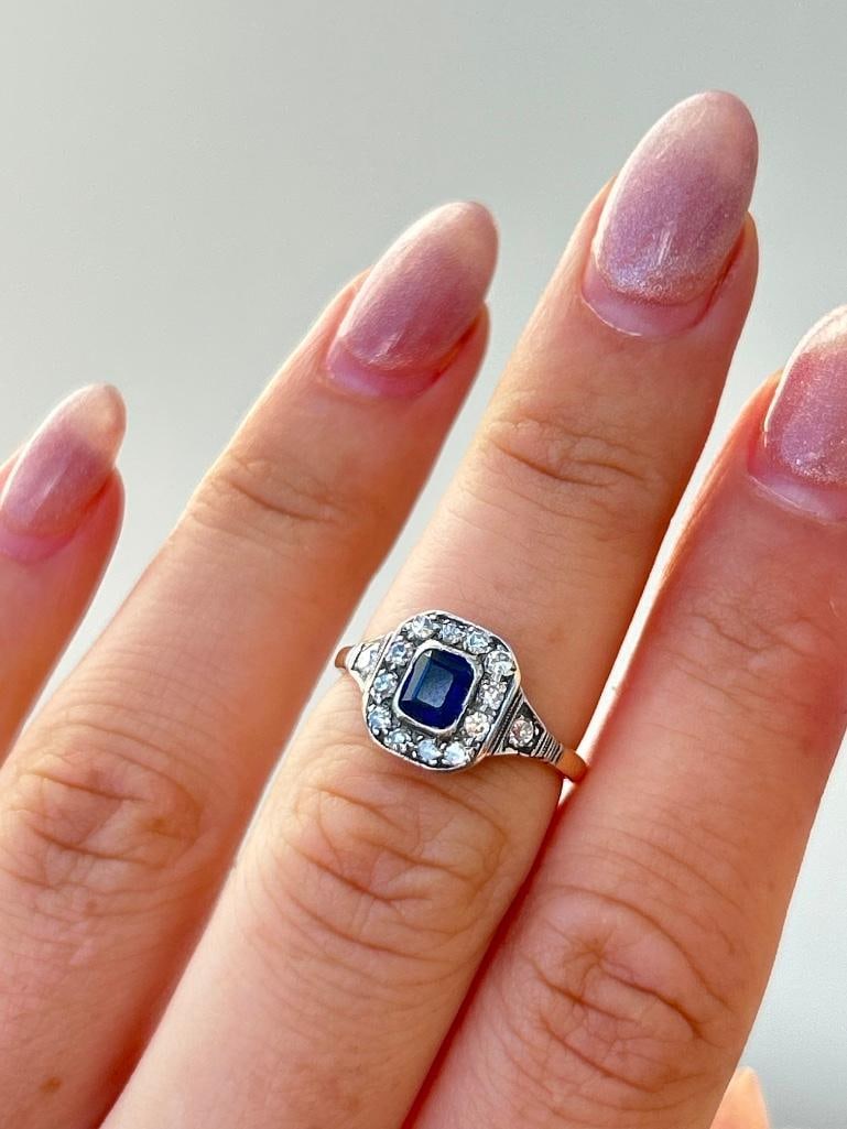 *Edwardian Sapphire and Diamond 18 Carat Gold Cluster Ring: Edwardian Sapphire and Diamond 18 Carat Gold Cluster Ring The sapphire measures 20pts and the diamonds measure 3pts each. measurements size UK K1/2 US 51/2 head of ring 9.5mm x 9mm