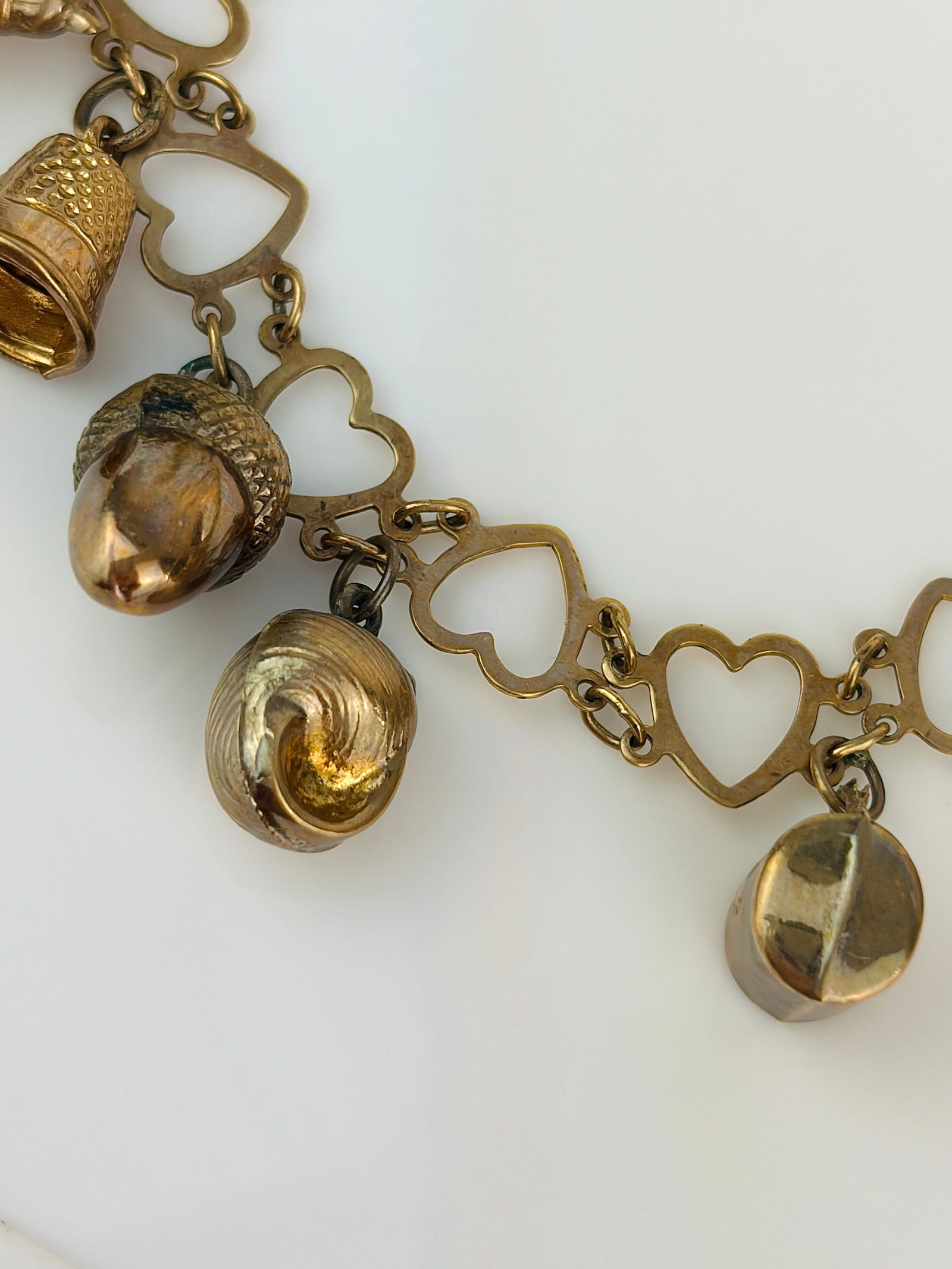 vintage hearts bracelet full of charms all in 9ct gold - 5