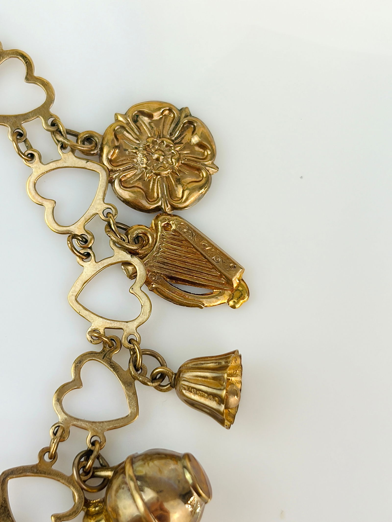 vintage hearts bracelet full of charms all in 9ct gold - 7