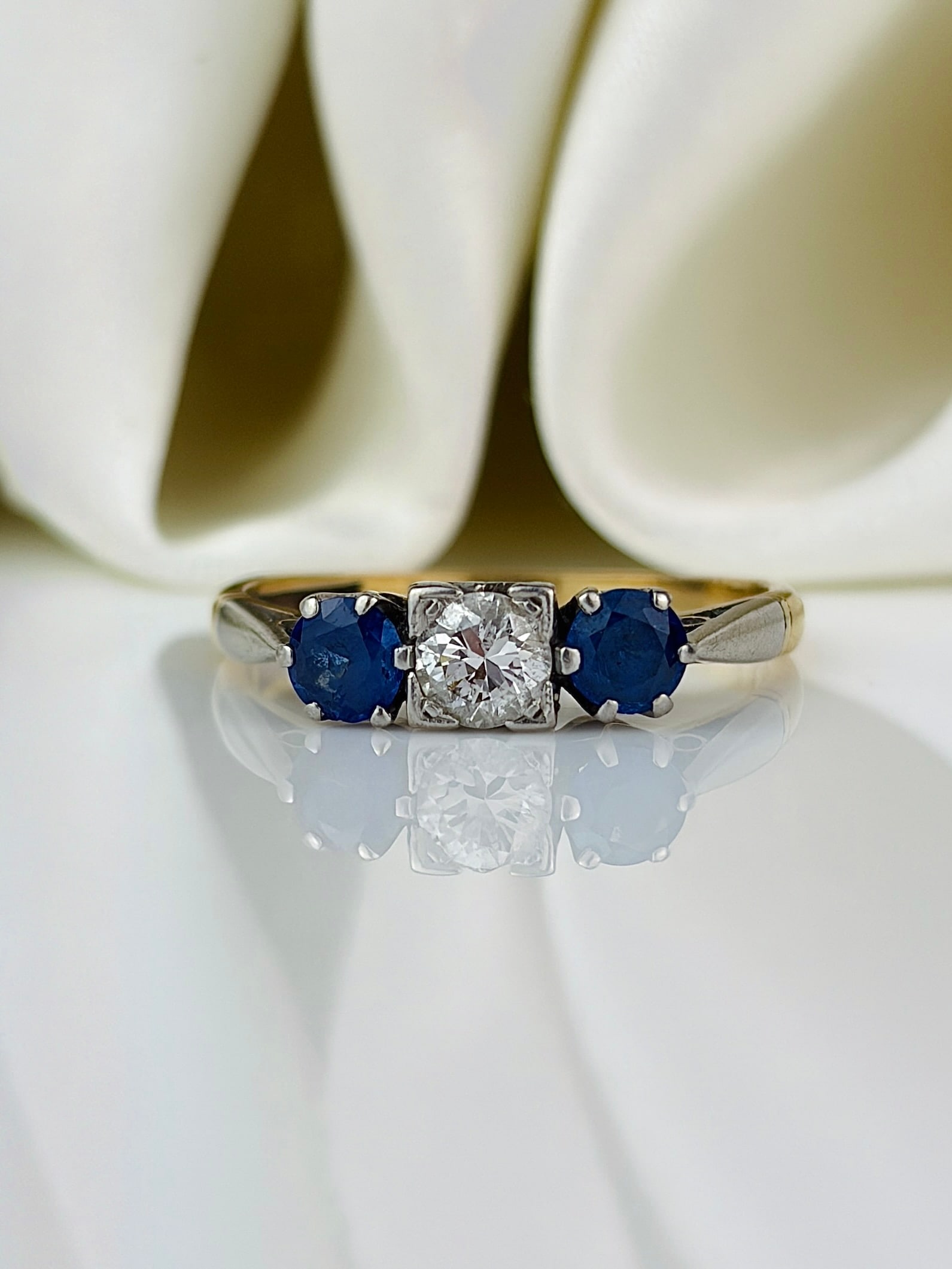 antique art deco era sapphire and diamond 3 stone ring in 18ct yellow gold and platinum: antique art deco era sapphire and diamond 3 stone ring in 18ct yellow gold and platinum Such a sweet ring! Weight: 2.58g Size: UK N1/2, US 7.25, Face of ring 4x12mm Materials: 18ct