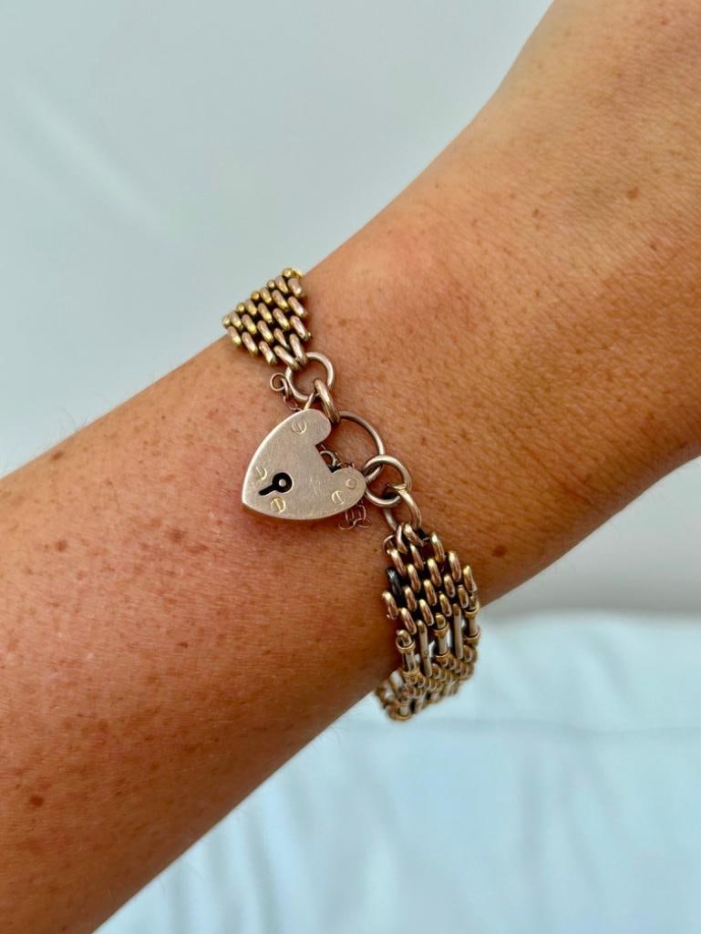 Wonderful 9ct Yellow Gold Gate Bracelet with Heart Padlock: Wonderful 9ct Yellow Gold Gate Bracelet with Heart Padlock gorgeous everyday wear bracelet! measurements length 19.5cm width 12mm weight 13.17g stamped