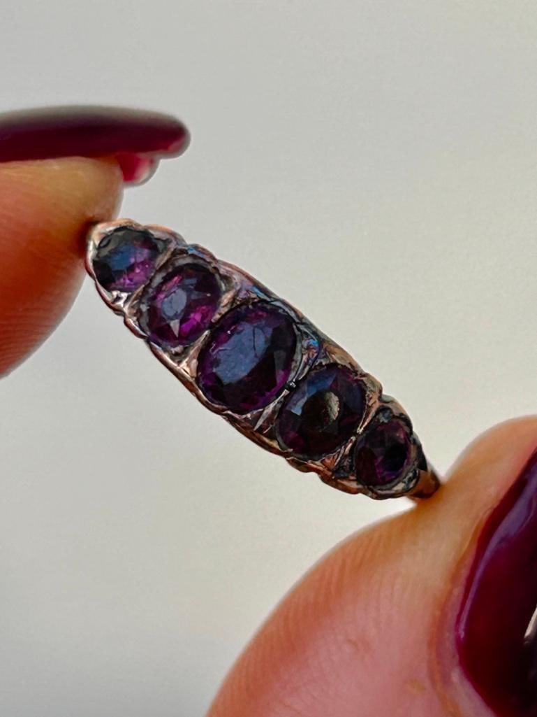 18ct Gold Amethyst Five Stone Ring: 18ct Gold Amethyst Five Stone Ring 5 wonderful amethyst stones measurements size UK R1/2 US 83/4 head of ring 18mm x 5mm weight 2.66g hallmarked 18 materials 18ct