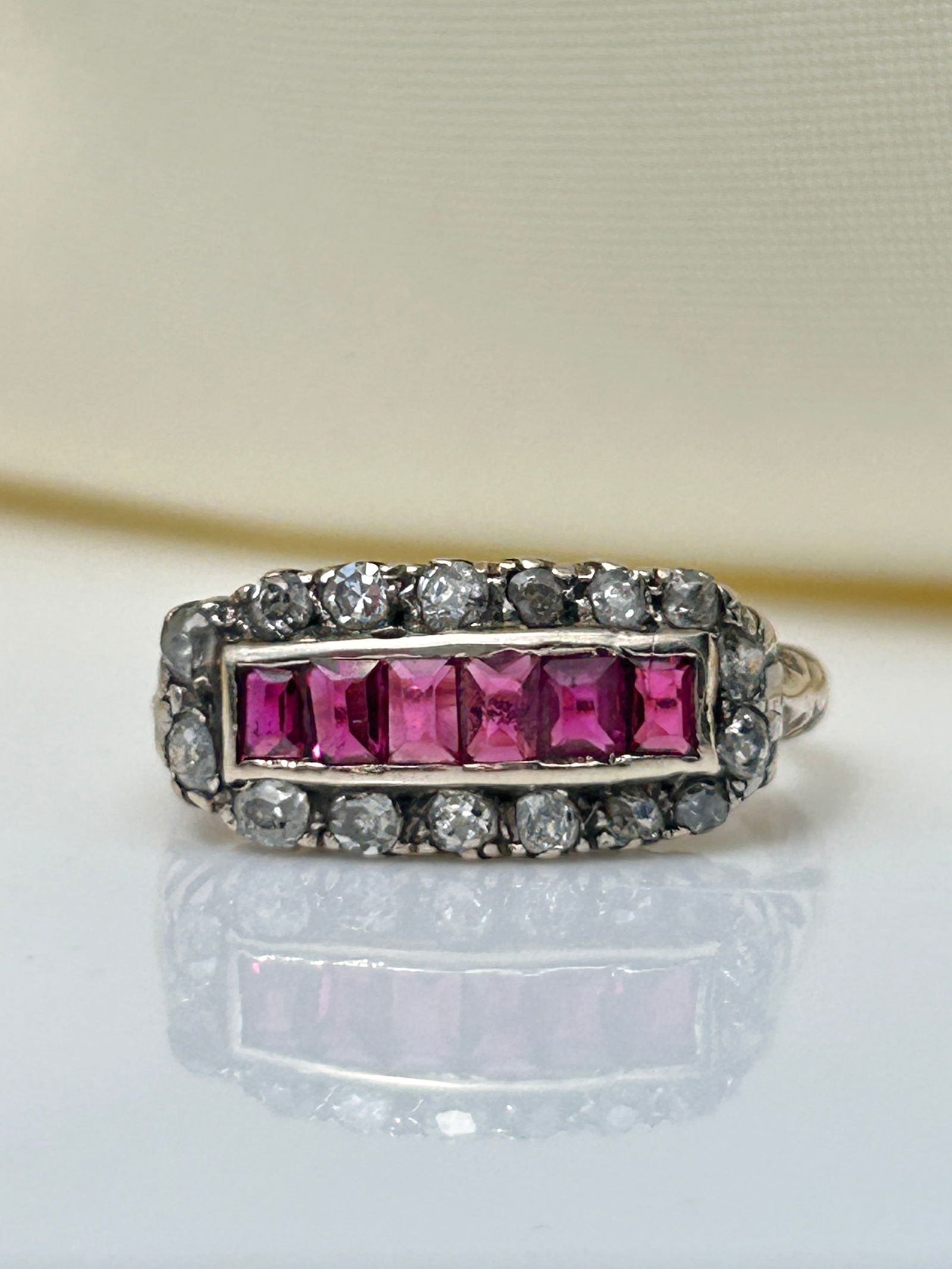 antique ruby and diamond c 1910 gold 3 row ring: antique ruby and diamond c 1910 gold 3 row ring Ring size uk O / usa 7.5 wweight 3.25 g Office use only CDC 