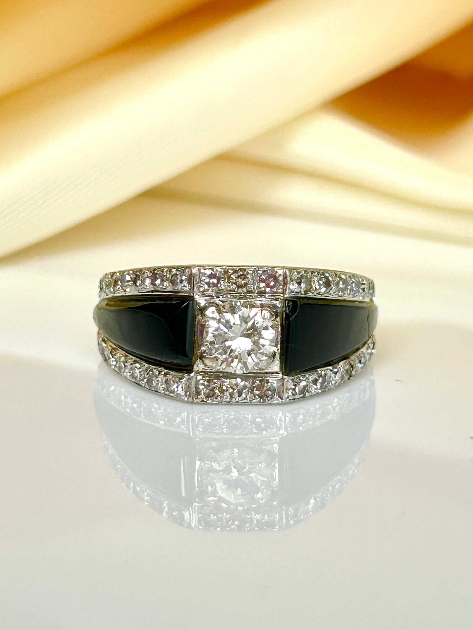 antique art deco era onyx and diamond band style ring central diamond 55pts: antique art deco era onyx and diamond band style ring central diamond 55pts bright centre stone 55pts diamond weight 7.8 g ring size uk O / usa 7.5 