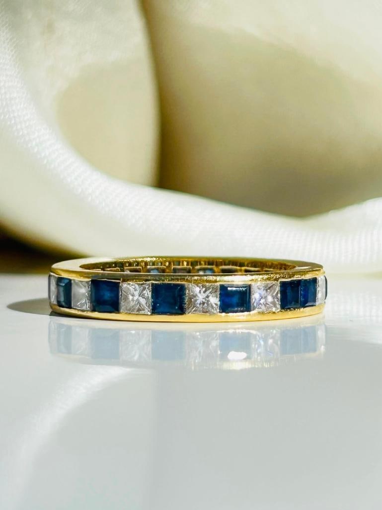 * Vintage 9 Carat Yellow Gold Sapphire and Diamond Band: Vintage 9 Carat Yellow Gold Sapphire and Diamond Band ‘Engraved thou art lovely and true' measurements size UK N US 7 band width 3mm weight 4.5g materials 