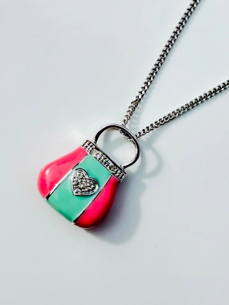 Sweet 9ct White Gold Pink and Green Enamel and Diamond Handbag Pendant on 9ct White Gold Chain: Sweet 9ct White Gold Pink and Green Enamel and Diamond Handbag Pendant on 9ct White Gold Chain sweet handbag pendant measurements length 40cm pendant size 17mm x 13mm weight 4.62g