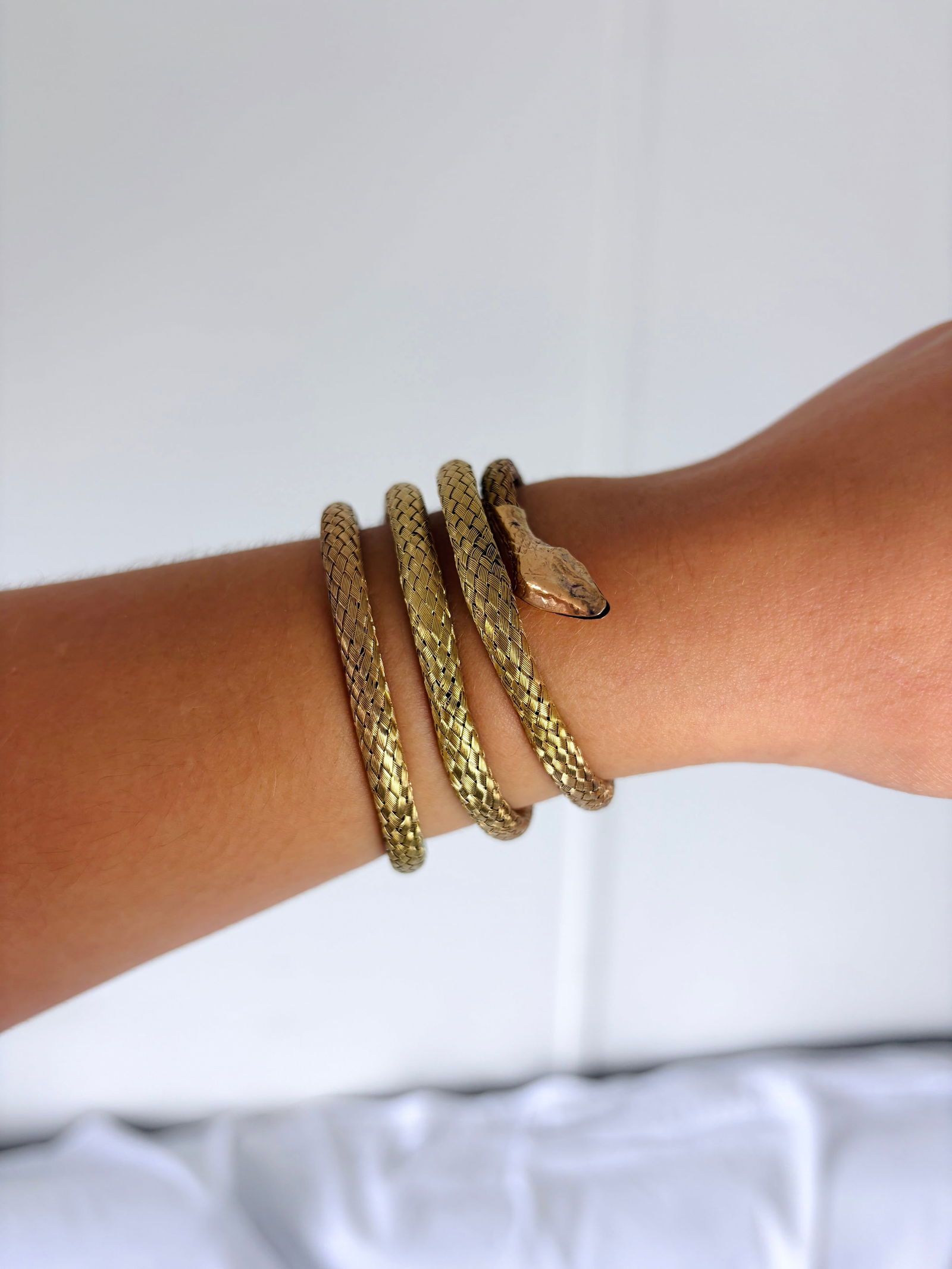 Coiled Snake Bangle in Gilt Metal - 9