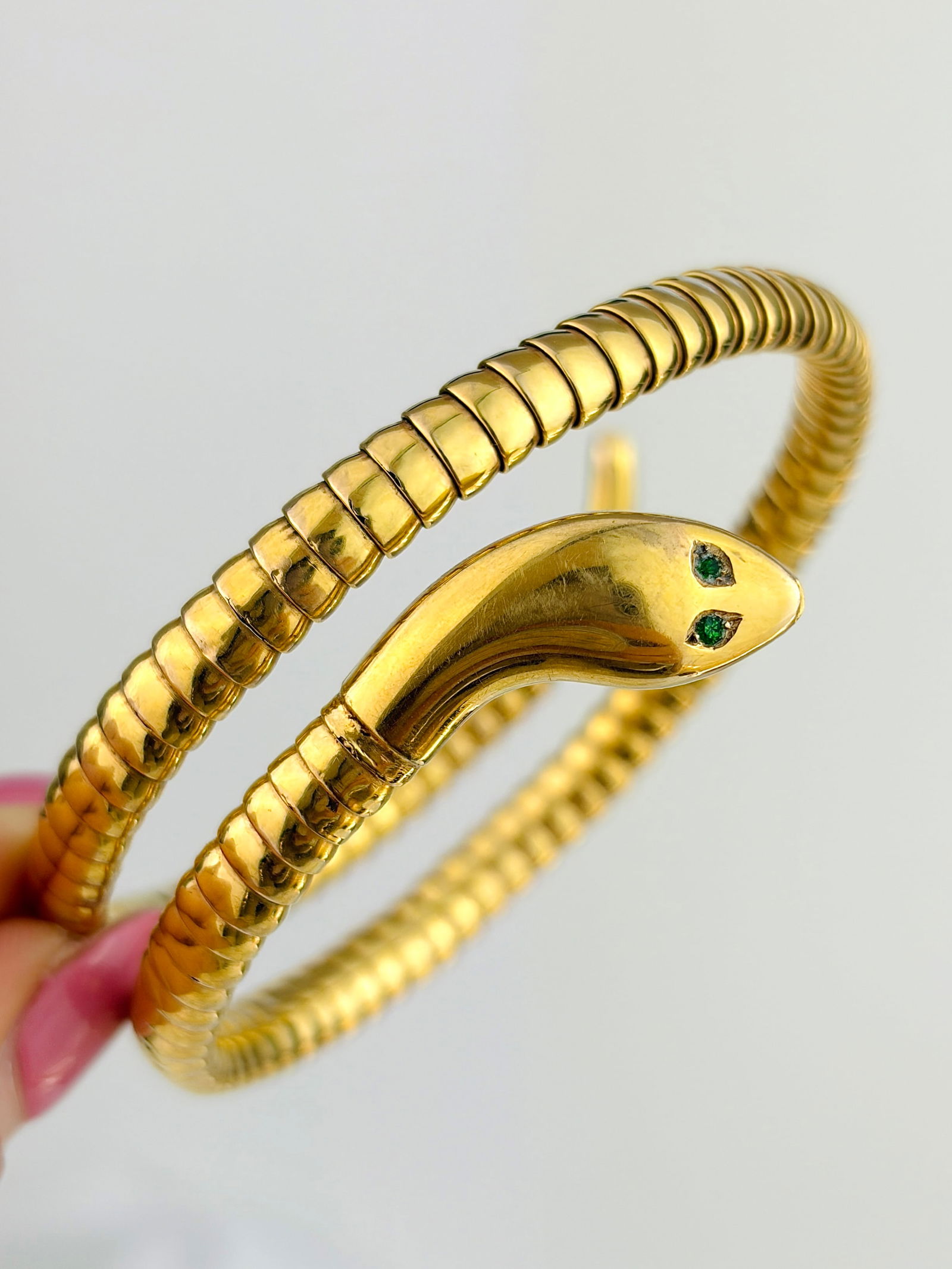 VINTAGE 9CT YELLOW GOLD COILED SNAKE BANGLE BRACELET WITH GREEN PASTE EYES: VINTAGE 9CT YELLOW GOLD COILED SNAKE BANGLE BRACELET WITH GREEN PASTE EYES Absolutely incredible coiled snake bangle!