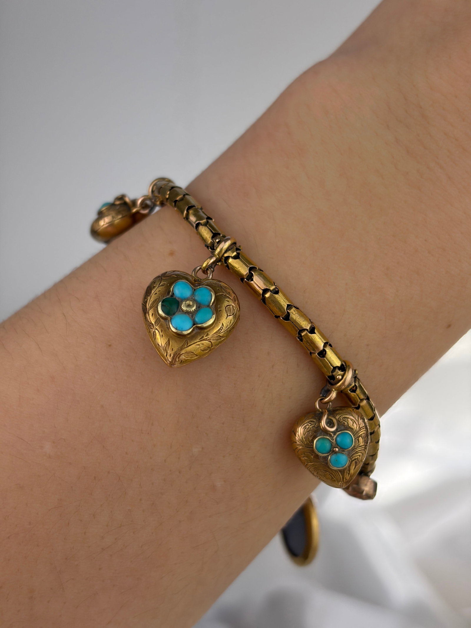 ANTIQUE VICTORIAN 18CT YELLOW GOLD TURQUOISE HEART, AND BLUE ENAMEL AND PEARL CHARM BRACELET - 9