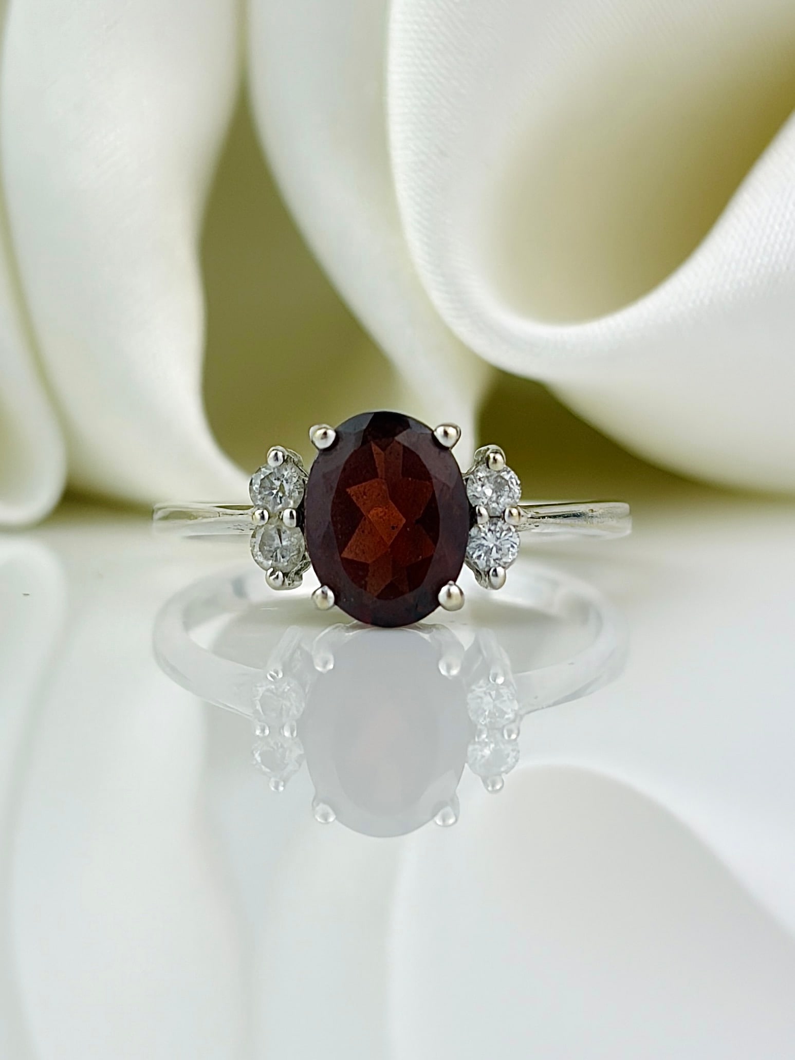 Sweet 14ct White Gold Garnet and Diamond Ring: sweet 14ct white gold garnet and diamond ring Lovely deep red garnet stone!