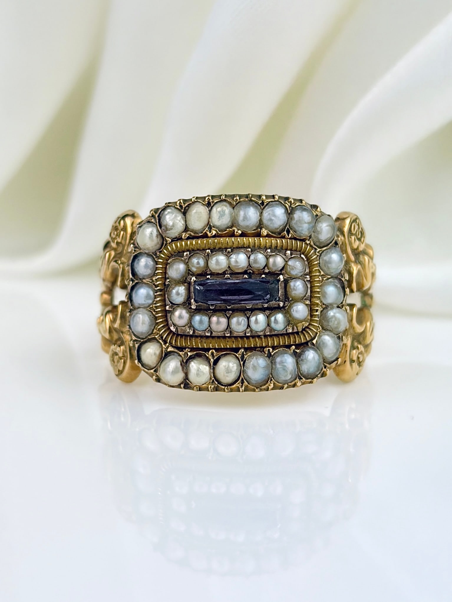 GORGEOUS ANTIQUE GEORGIAN 18CT GOLD PEARL AND AMETHYST HALO RING: GORGEOUS ANTIQUE GEORGIAN 18CT GOLD PEARL AND AMETHYST HALO RING A truly showstopping piece! Weight: 5.3g Size: UK O1/2, US 7.75, Width 12mm, height off finger 4mm Materials: 18ct