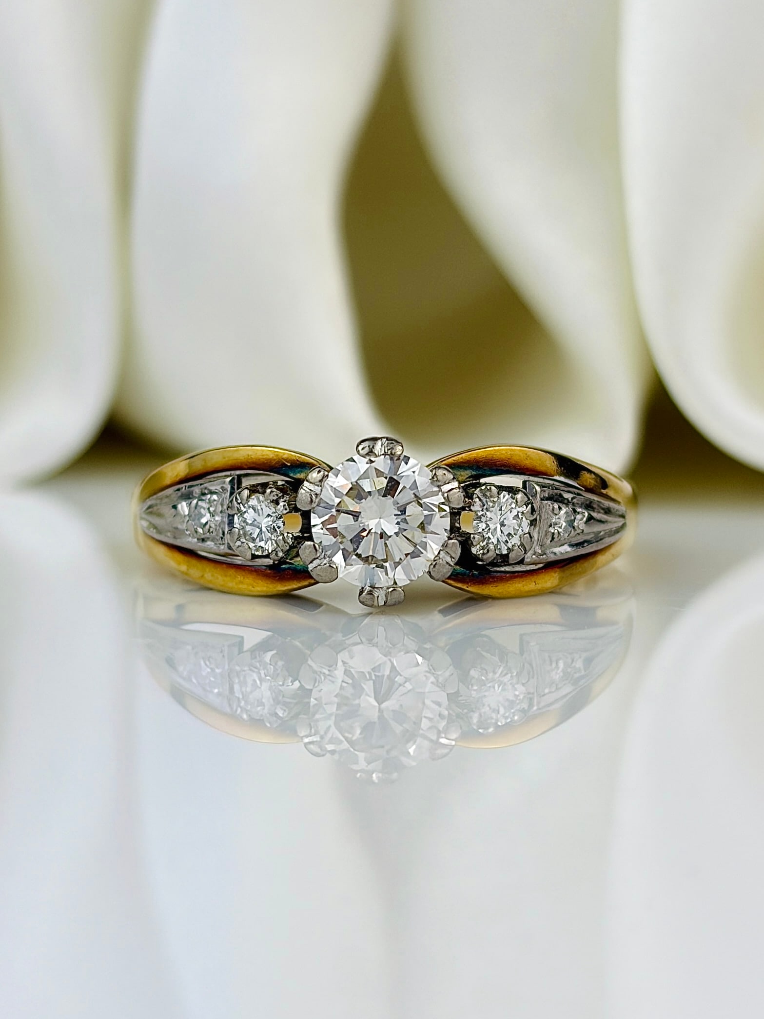 Chunky 14ct Yellow Gold 75pts Diamond Solitaire Ring: Chunky 14ct yellow gold 75pts diamond solitaire ring Weight: 4.09g Size: UK O, US 7.5, Width 5.5mm, Height off finger 6.5mm Materials: 14ct yellow gold Hallmarks: Stamped 585