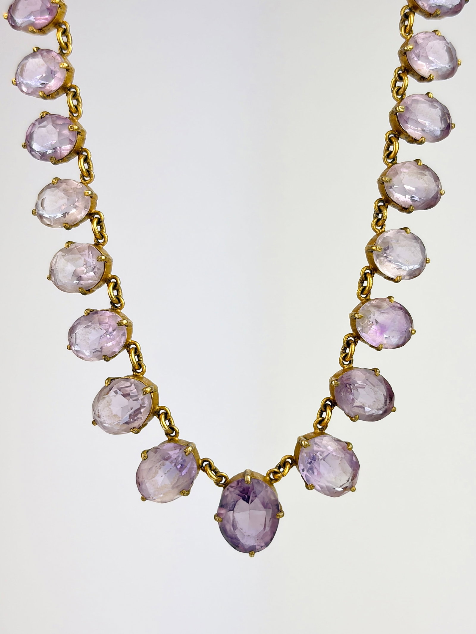WONDERFUL 1/20TH 14CT GOLD PALE AMETHYST RIVIERE NECKLACE: WONDERFUL 1/20TH 14CT GOLD PALE AMETHYST RIVIERE NECKLACE Beautiful necklace featuring pale amethyst stones! Weight: 30g Size: Length 38cm, width 13mm Materials: 1/20th 14ct