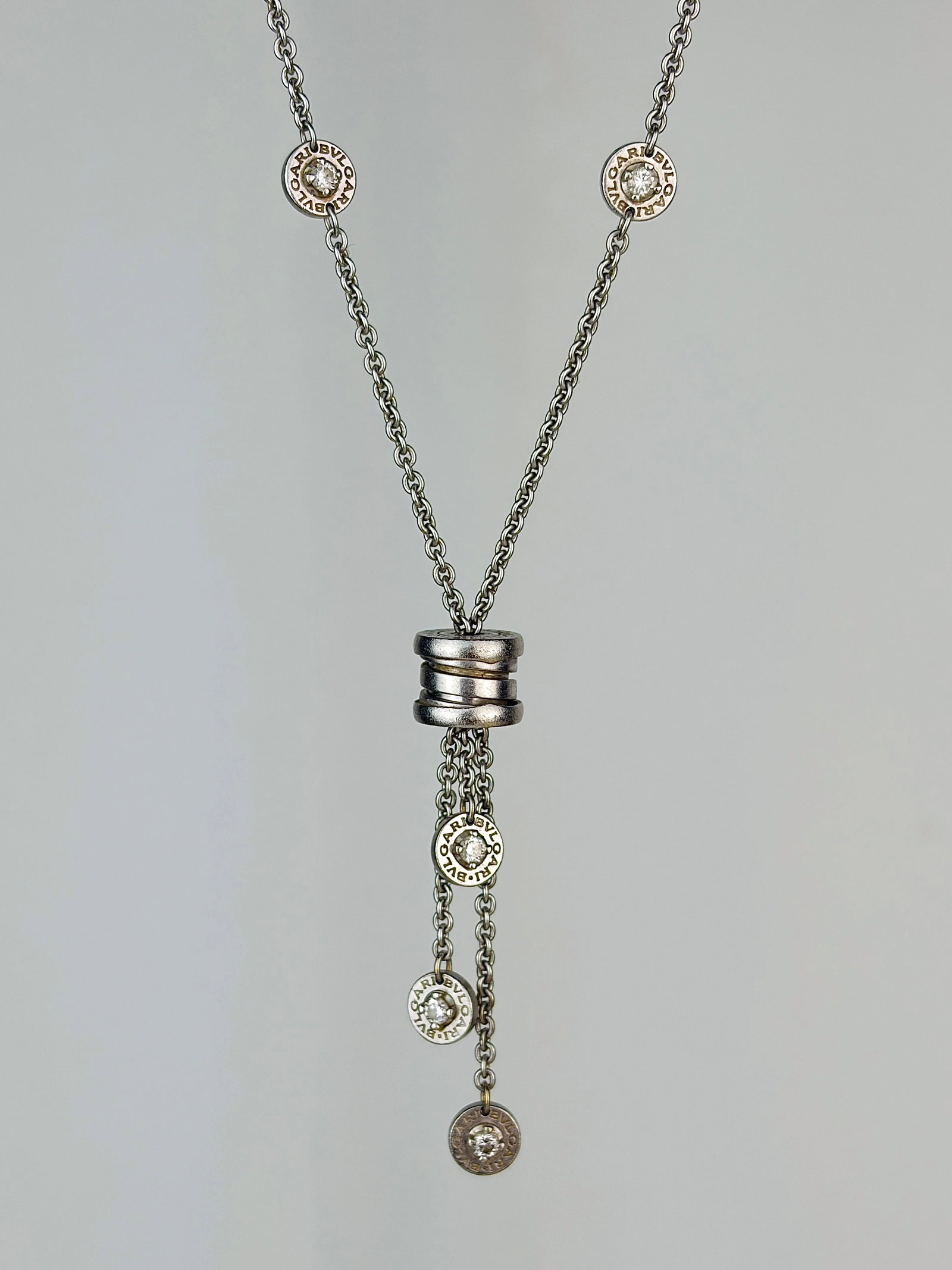 18ct White Gold BVLGARI Diamond Multi Strand Necklace: 18ct white gold BVLGARI diamond multi strand necklace Wonderful designer Bvlgari necklace with circular diamond details! Weight: 15.9g Length: 45.5cm Drop: 46mm Materials: 18ct white