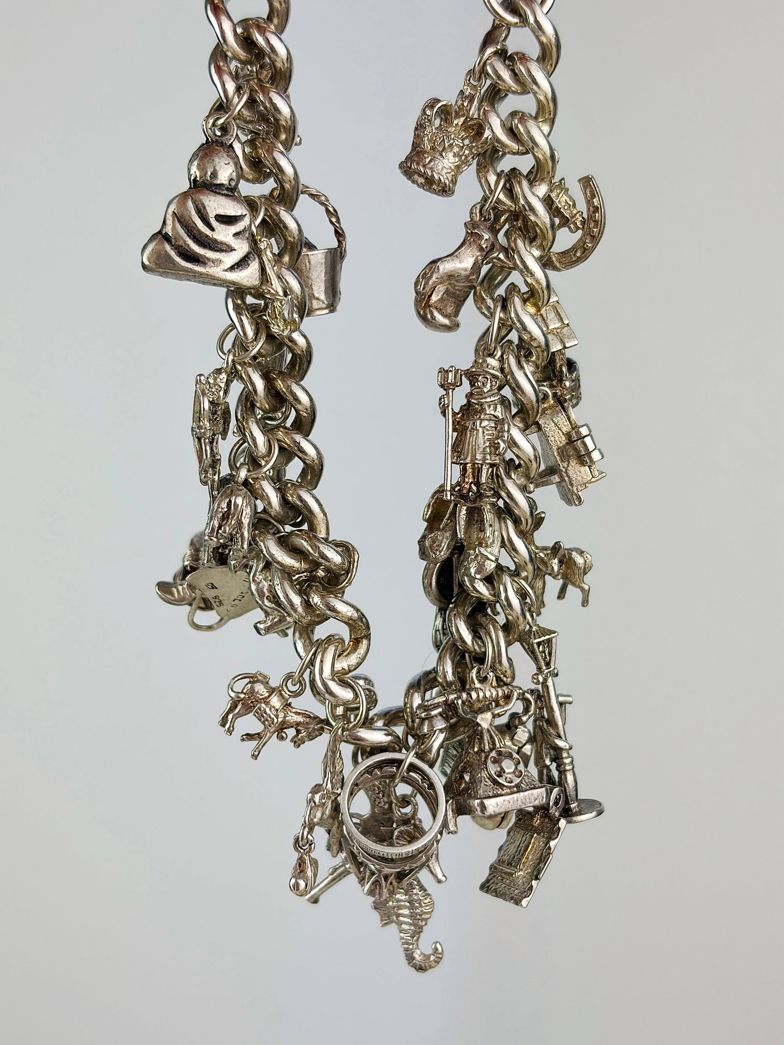 Heavy Sterling Silver Full Charm Bracelet with Opening Charms: Heavy sterling silver full charm bracelet with opening charms 28 charms and a heart padlock!