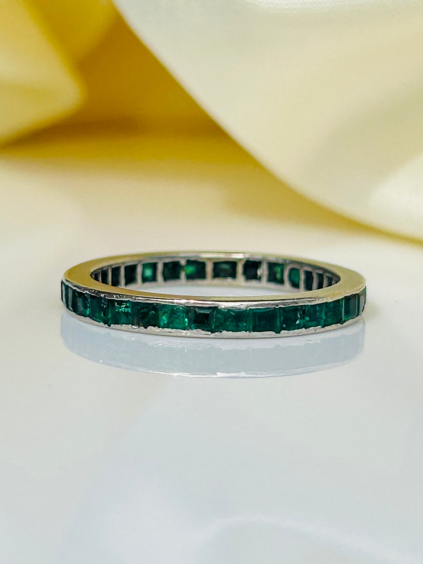 Antique Platinum Emerald Full Eternity Ring: Antique Platinum Emerald Full Eternity Ring Weight: 3.19g Size: UK S1/2, US 9.75 Width: 2.5mm Height off Finger: 2mm Hallmarks: None Present Condition: The overall condition is good, there is some