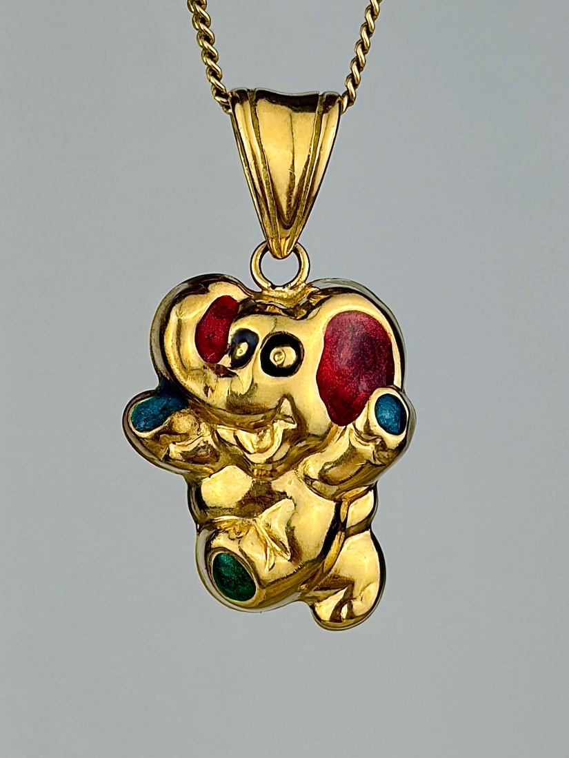 HEAVY 18CT YELLOW GOLD ENAMEL ELEPHANT PENDANT: HEAVY 18CT YELLOW GOLD ENAMEL ELEPHANT PENDANT So charming! Weight: 4.15g Size: 31x17mm Materials: 18ct gold Hallmarks: 750, Orsogrigio (Italian fine jewellery brand based in Tuscany)