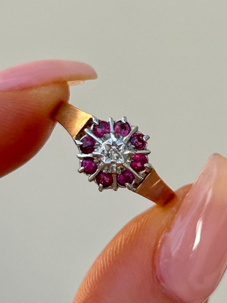 Sweet 9ct Gold Ruby and Diamond Flower Ring: Sweet 9ct Gold Ruby and Diamond Flower Ring the sweetest flower ring truly delightful measurements size UK O1/2 US 71/2 head of ring 8mm x 8mm weight 2.42g &nb