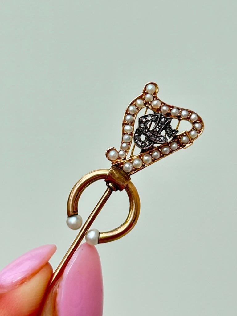 Antique Rose Cut Diamond and Pearl Lyre Stick Pin in Gold: Antique Rose Cut Diamond and Pearl Lyre Stick Pin in Gold beautiful and charming stick pin! measurements size 47mm x 13mm weight 3.74g materials </