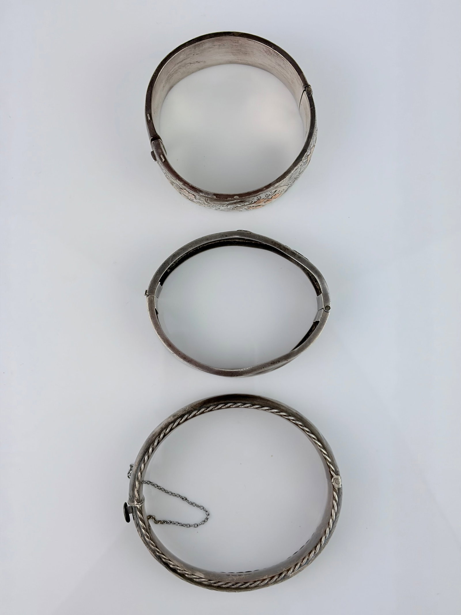 MIXED LOT 3X SILVER BANGLES WITH GOLD OVERLAY AF: MIXED LOT 3X SILVER BANGLES WITH GOLD OVERLAY AF All dented
